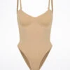 Bloch Seamless Brief Bodysuit 1 Bloch Seamless Brief Bodysuit -Dance costume bl l3137 nud bloch seamless brief bodysuit tan front 98195.1678925951